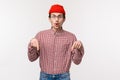 Waist-up portrait excited and surprised amused handsome caucasian hipster in beanie and glasses telling someone what he