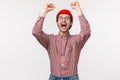 Waist-up portrait of excited and thrilled happy relieved man winning prize, receive award scream from joy and delight