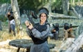 Portrait of happy woman in paintball equipment Royalty Free Stock Photo