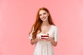 Waist-up portrait lovely caring redhead girl bring delicious peace cake from kitchen, smiling joyfully, having chat with Royalty Free Stock Photo