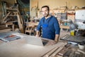 Mature Carpenter Posing in Workshop Royalty Free Stock Photo