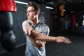 Sportsman doing shoulder workout during fitness training Royalty Free Stock Photo