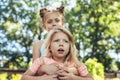 Small girls playing outdoors with delight Royalty Free Stock Photo