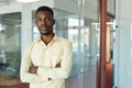 Young African Businessman Posing in Office Royalty Free Stock Photo