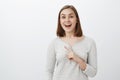 Waist-up shot of enthusiastic energized cute girl reacting to awesome offer of friend going sit in cafe smiling joyfully