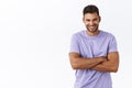 Waist-up shot masculine healthy handsome caucasian man with bristle in purple t-shirt, cross arms over chest, smiling