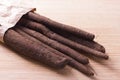 Waistband salsify in paper bag Royalty Free Stock Photo