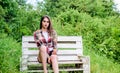 Wait for date. time to relax. fashion and beauty. sexy woman sit on bench. trendy summer look. girl relax outdoor in