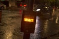 Wait sign box button in london during night time for crossing the road Royalty Free Stock Photo