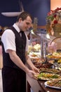 Waiter and buffet Royalty Free Stock Photo