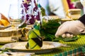 Waiter decorate and setting party dinner table in restaurant Royalty Free Stock Photo