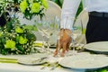 Waiter decorate and setting party dinner table in restaurant Royalty Free Stock Photo