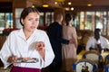 Waiter demonstrating his upset with little tips from restaurant visitors