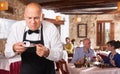 Waiter demonstrating his upset