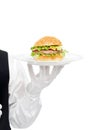 Waiter hand in white gloves holding hamburger on plate