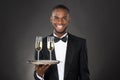 Waiter Holding Champagne Drink Royalty Free Stock Photo