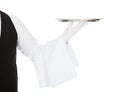 Waiter holding empty silver tray Royalty Free Stock Photo