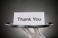 Waiter Holding Plate With The Text Thank You On Paper Royalty Free Stock Photo