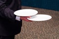 Waiter is holding plates Royalty Free Stock Photo