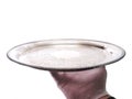 A waiter holding a silver tray Royalty Free Stock Photo