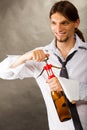 Waiter opens wine bottle. Royalty Free Stock Photo