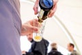 The waiter pours beer into a glass Royalty Free Stock Photo