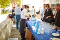 Waiter pours a drink