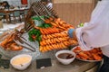 Waiter prepare Steamed Shrimps for the buffet