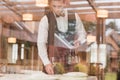 Waiter putting wineglasses on table Royalty Free Stock Photo