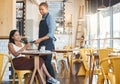 Waiter, retail and coffee shop customer tapping phone on machine for secure and easy mobile payment at cafe store Royalty Free Stock Photo