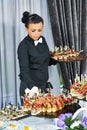 Waiter serving catering table Royalty Free Stock Photo