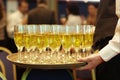 waiter serving champagne tray Royalty Free Stock Photo