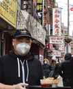 Waiter Serving Food for Outdoor Dining in Chinatown New York Royalty Free Stock Photo