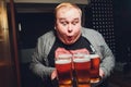 Waiter serving glasses of cold beer on the tray. Royalty Free Stock Photo