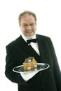 Waiter serving a house