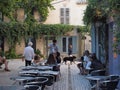 Waiter serving table in St. Remy in France