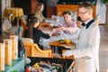 The waiter shifts the seafood on a tray in the restaurant.