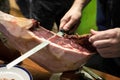 Waiter slicing serrano ham Royalty Free Stock Photo