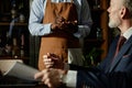 Waiter taking an order from businessman Royalty Free Stock Photo