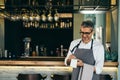 Waiter taking order from customers Royalty Free Stock Photo