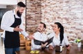 Waiter taking order in restaurant Royalty Free Stock Photo