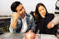 Waiter talking with the couple clients before serving tea and fo Royalty Free Stock Photo