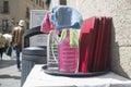 Waiter tray full of disinfectant spray products over restaurant terrace