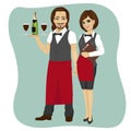 Waiter and waitress holding a serving tray with glass and bottle of champagne and menu