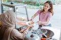 Waiters gives the food to the woman Royalty Free Stock Photo