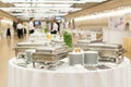 Waiters prepare buffet before a coffee break at business conference meeting. Royalty Free Stock Photo