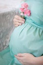 Waiting for baby-girl, mammy`s belly Royalty Free Stock Photo