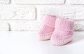 Waiting baby, baby shower. Pink girl newborn shoes Royalty Free Stock Photo