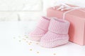 Waiting baby, baby shower. Pink girl newborn shoes Royalty Free Stock Photo