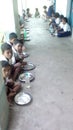 Waiting for the food the mid day meal programme of UNICEF in some unknown School in India.
